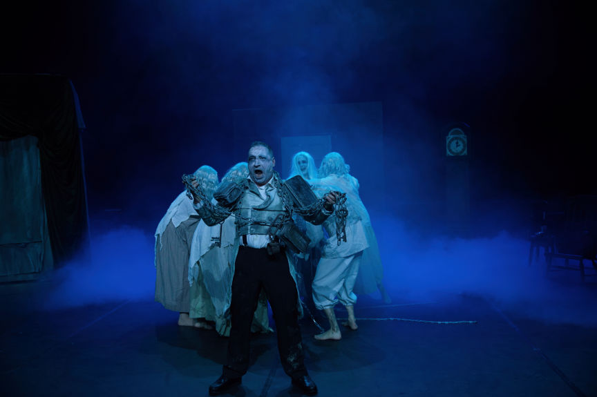 Actors and man on stage in Theatre stage show 